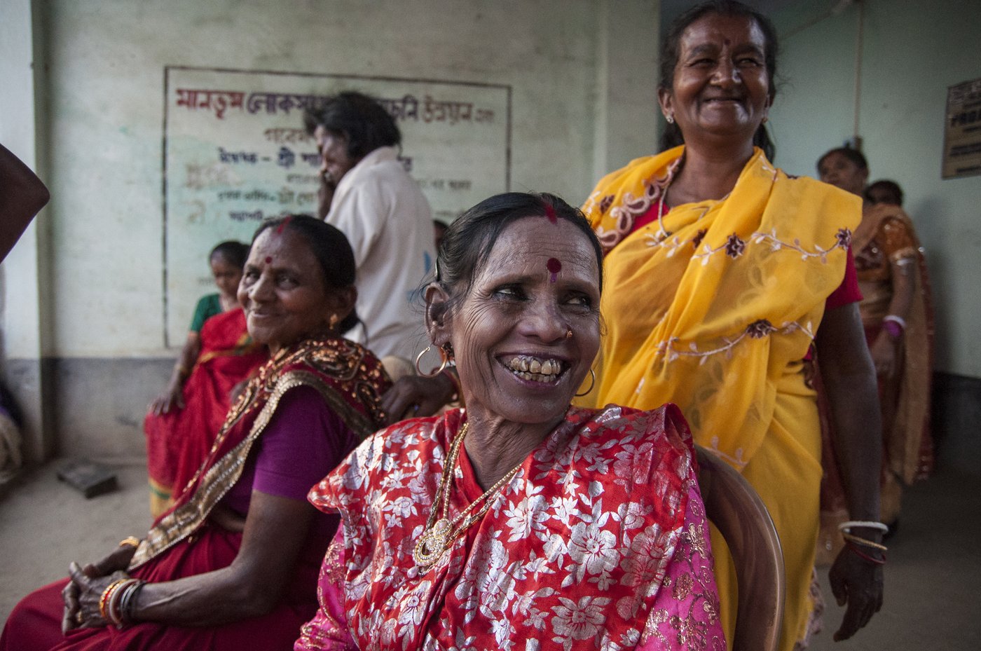 A group of women are smiling