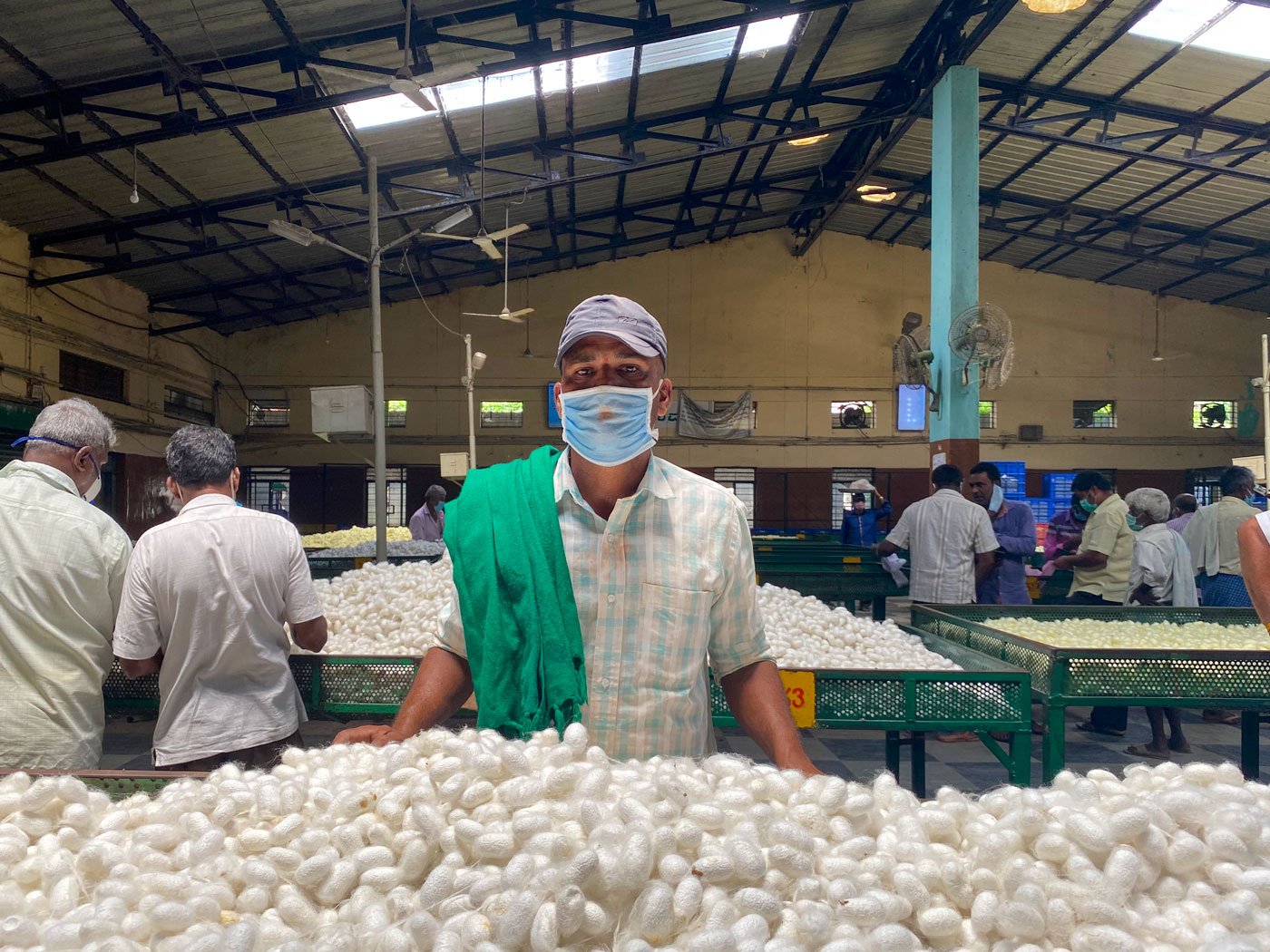 On the return journey to Handiganur village, silk cocoon farmer Nikhirappa Gadiyappa's hope was gone – and his fears had come true