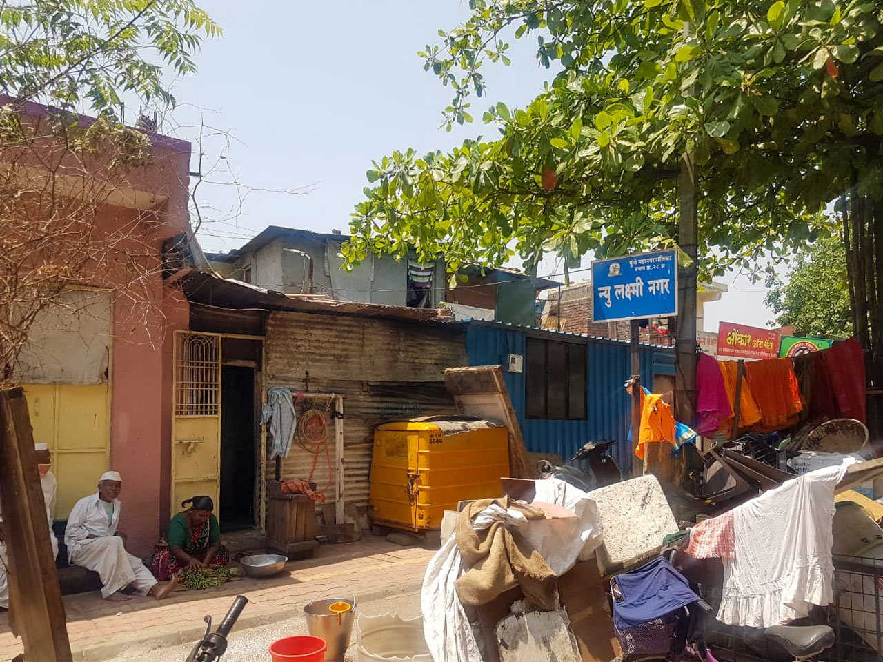 Left: Laxmi Nagar colony in Kothurd. Right: A ration shop in the area, where subsidised food grains are purchased