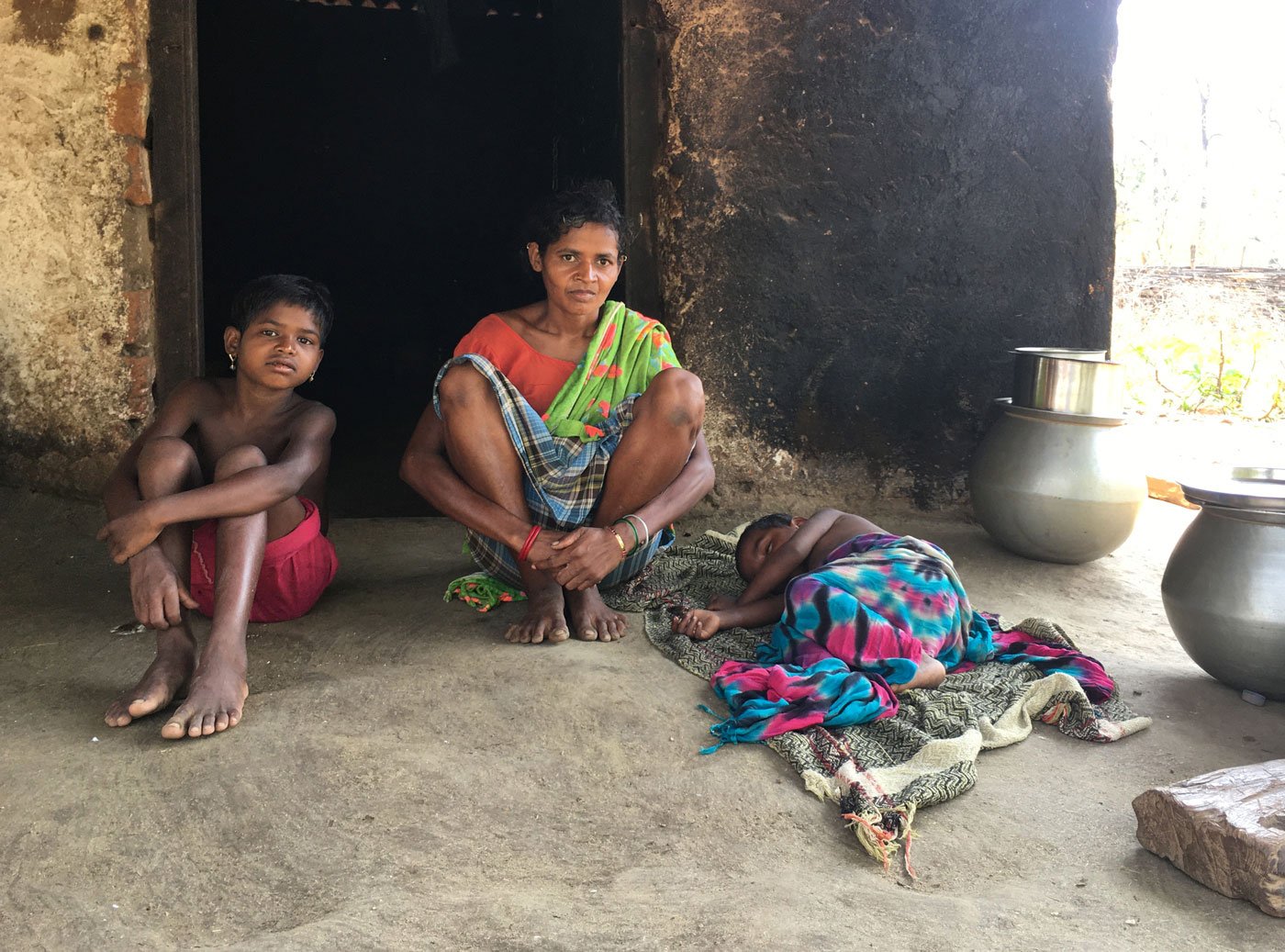 Sukmati with her younger daughter Sarita and infant son; she and Andoram Madkam had eight children; five have died, including Jamlo
