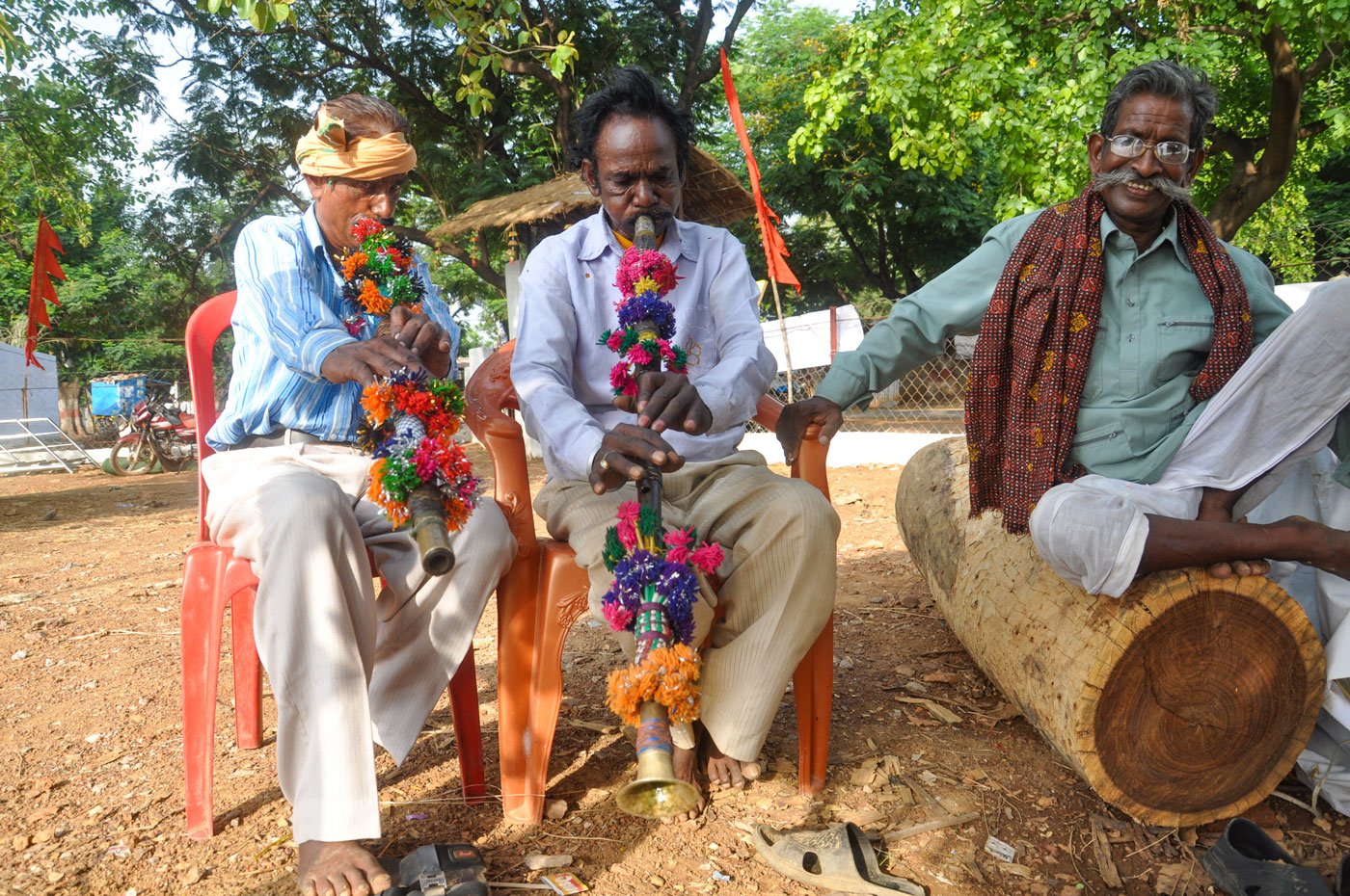 Left: Baans vaadak Babulal Yadav. Right: Babulal Yadav (middle) and Sahadev Yadav (right), who says, 'Now we get rarely any invitations'