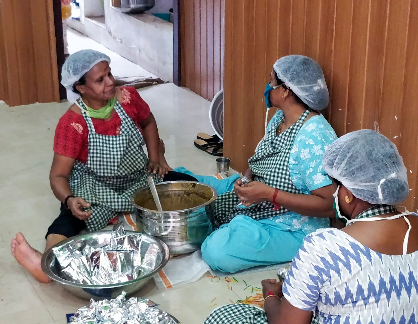 Kudumbashree members in the Janakeeya Hotel near Thiruvananthapuram's M.G. Road cook and pack about 500 takeaway meals every day