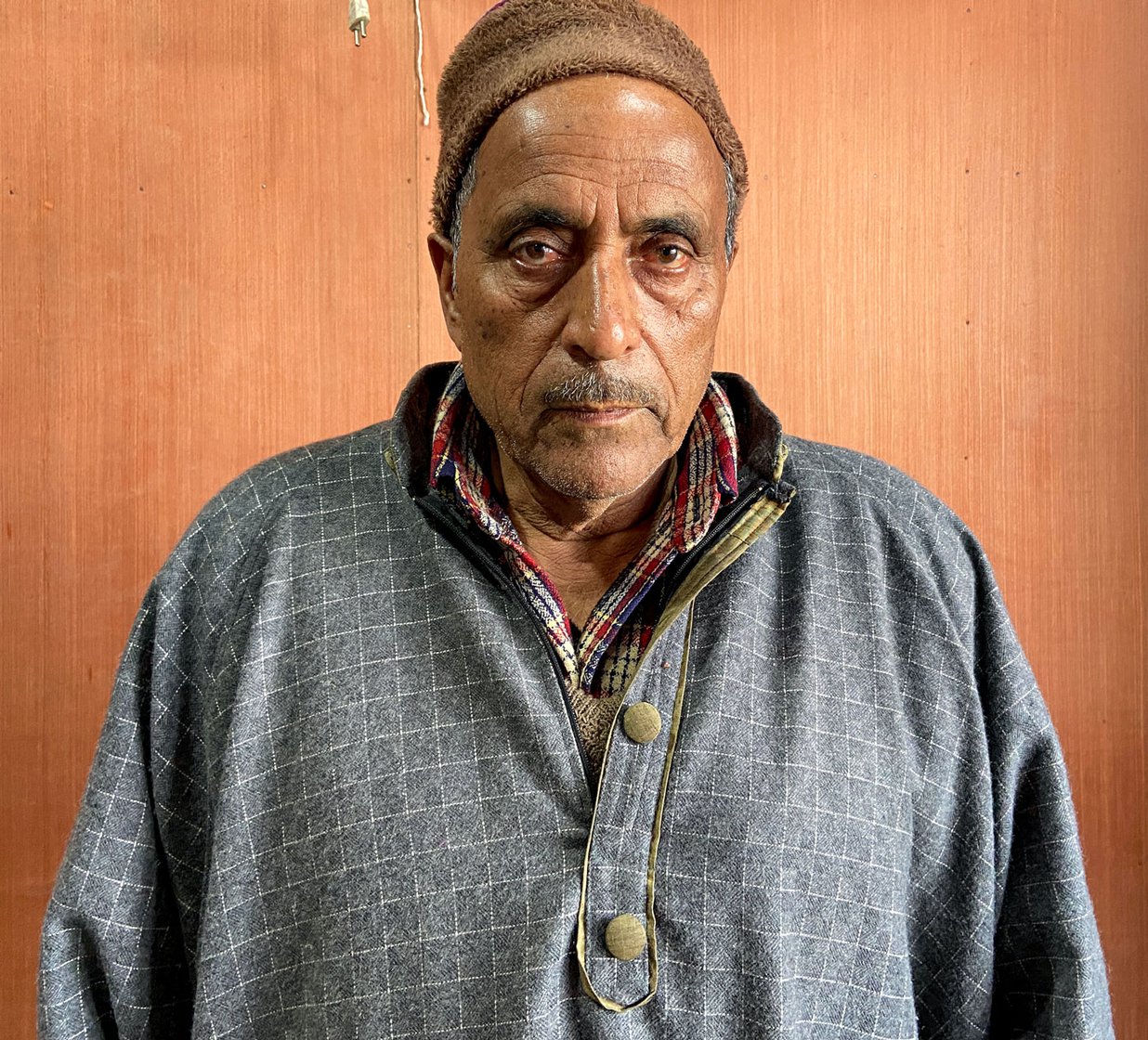 Left: Mohammad Sidiq Chachoo, who sells leather goods to tourists, says, 'We prefer these clinics because they are nearby and have medicines readily available'. Right: The chemist-clinic he is visiting is run by Bilal Ahmad Bhat