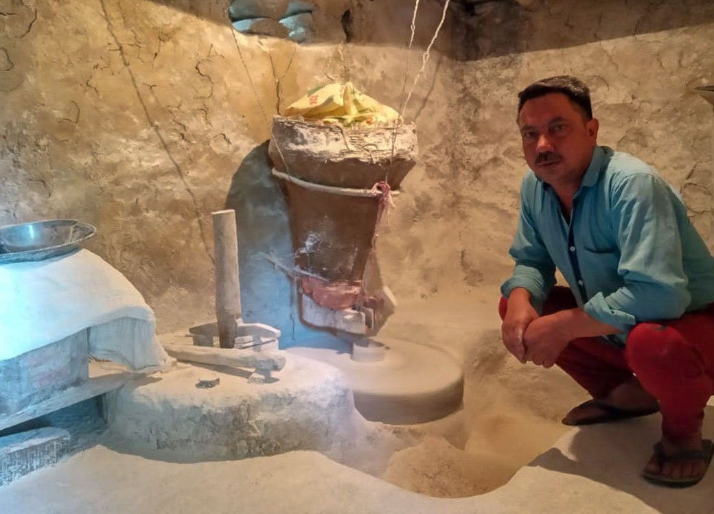 Om Prakash working at the mill