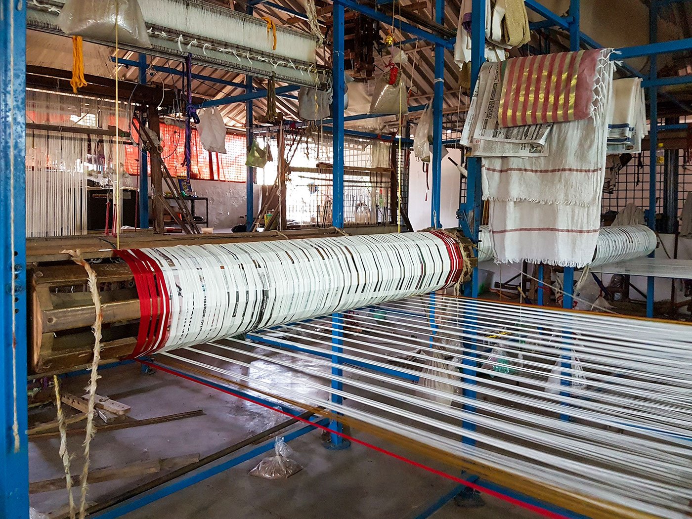 The roller of a handloom in Kuthampully, over which 4,000 to 4,500 threads of yarn are strung.