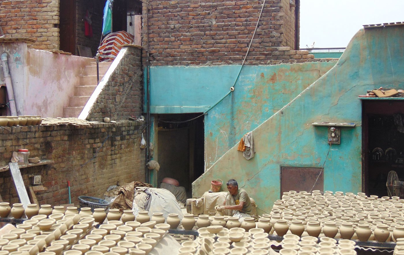 'Many potters and helpers from UP and Bihar have gone back to their villages...,' says Harkishan Prajapati (left), the colony's pradhan