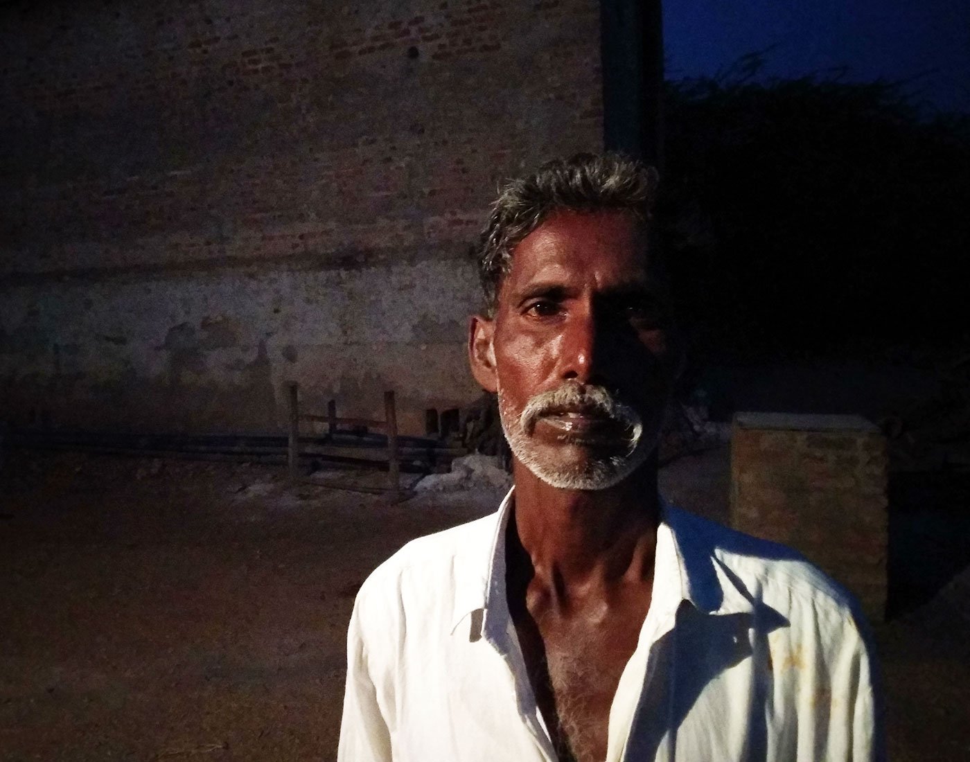 a portrait of a Dalit farmer