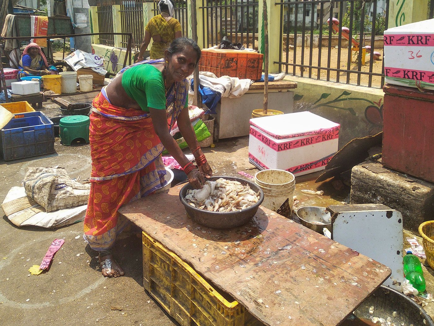 Left: The three-day relaxation in the lockdown 'is too little time', says Vasupalle Apparao. Right: Trying to sell prawns amid the lockdown