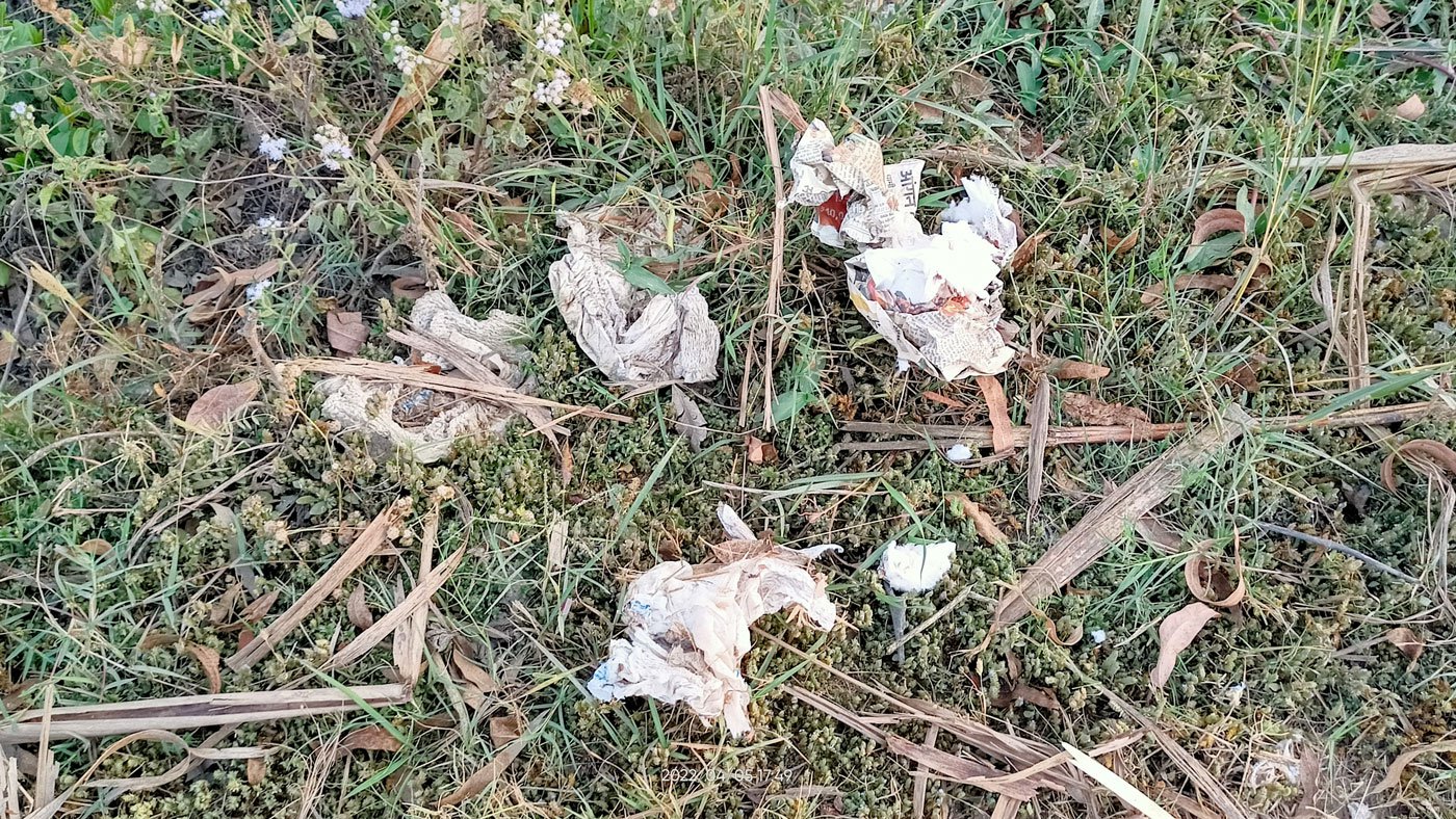 Used menstrual pads are thrown here (right) along with other garbage