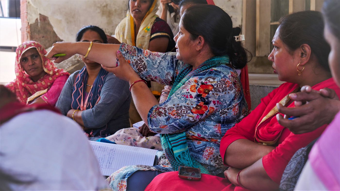 Sunita Rani (centre) with other ASHA facilitators.'The government should recognise us officially as employees', she says