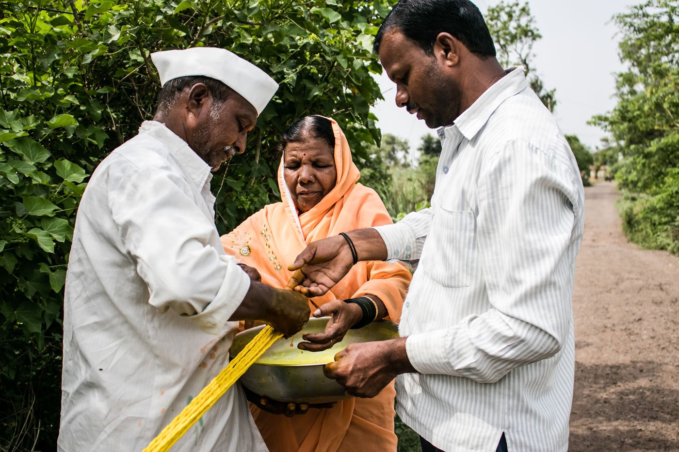 The Bhore family – Devu (wearing cap), Nandubai and Amit – craft ropes for farmers. There’s been no work now for weeks