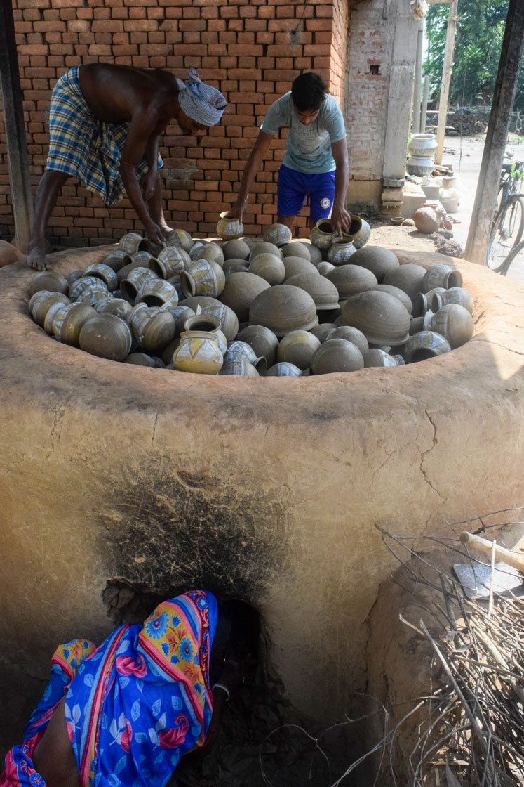In the potter's colony in West Bengal's Panchmura village, local Adivasi communities were the only buyers during the lockdown for traditional votive horses (right)
