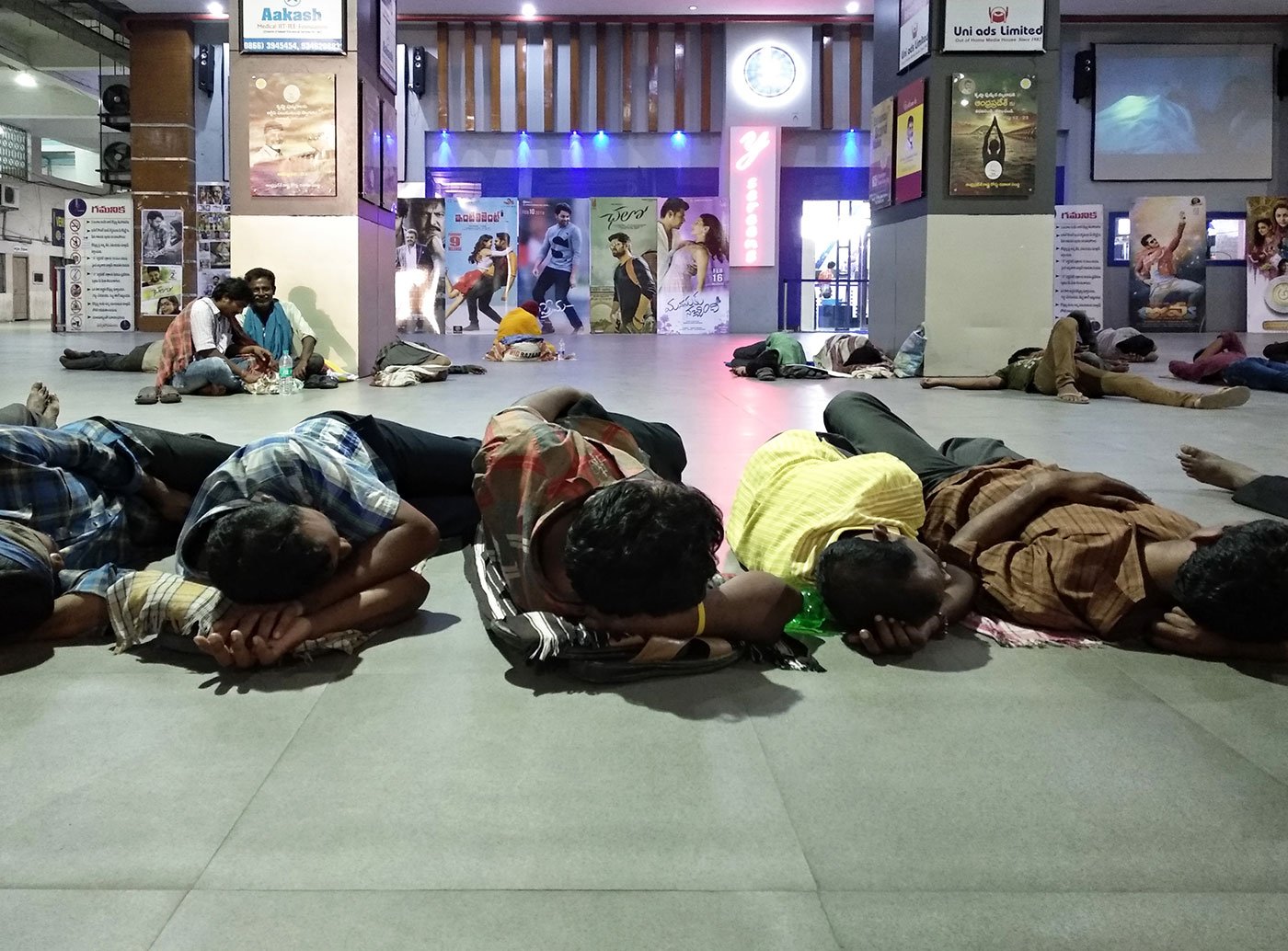 Homeless people, who mostly are migrant daily wage labourer from rural parts of Andhra Pradesh, sleep in the Pandit Nehru Bus Station in Vijayawada.
