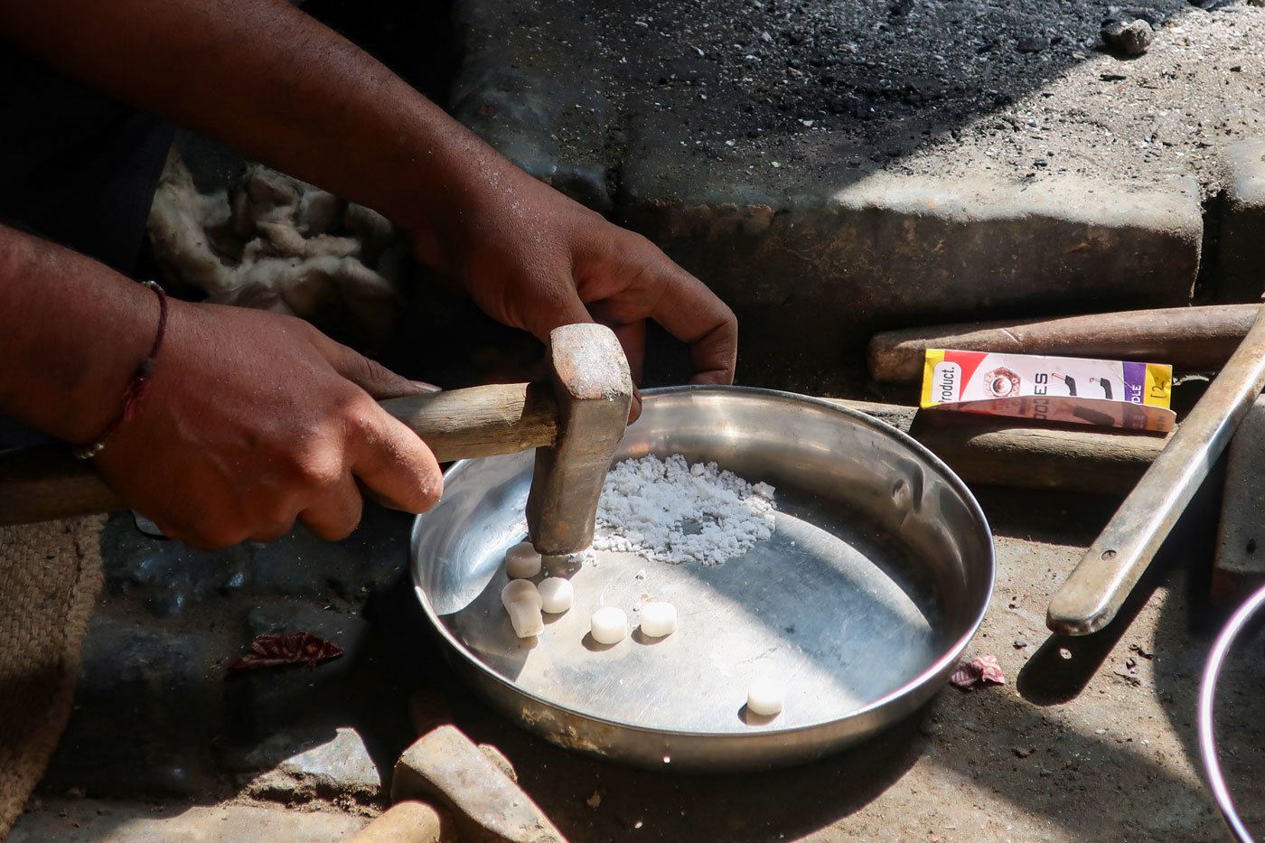 Nausadar is a powdered mix of caustic soda and ammonium chloride mixed in water and is used in the process of kalai