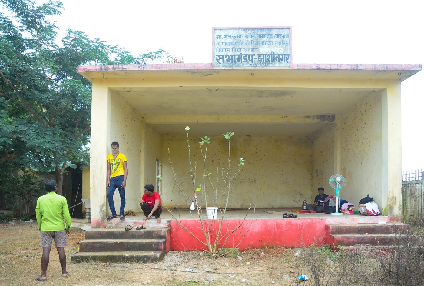 Vicky Arora (left) says Zashinagar's residents collected money during the lockdown to look after the migrants spending time in isolation upon their return home (right)
