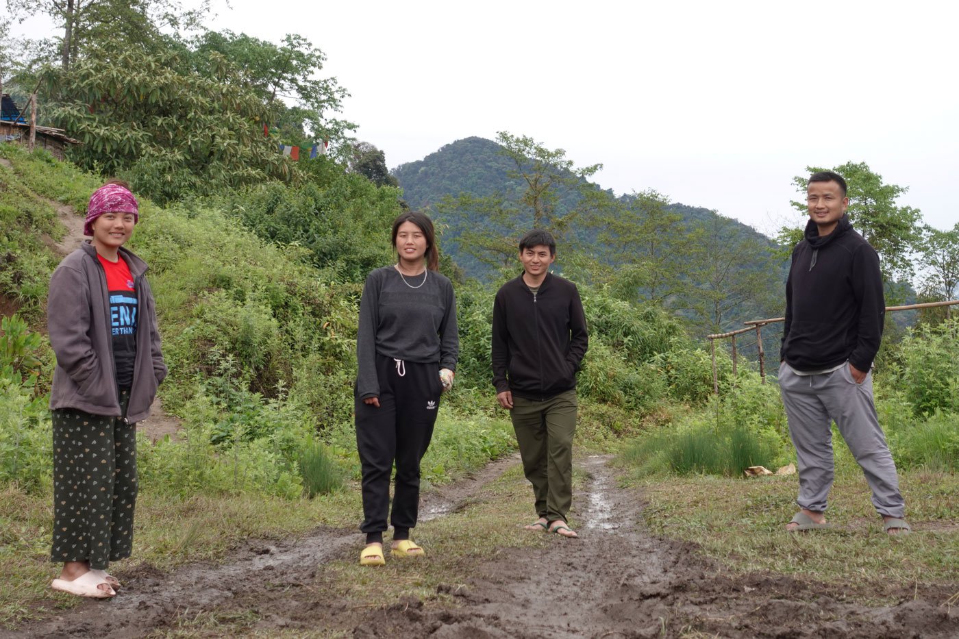 Left: From left to right, Dema, Aiti, Dambar and Micah outside their camp in Bongpu Blangsa.