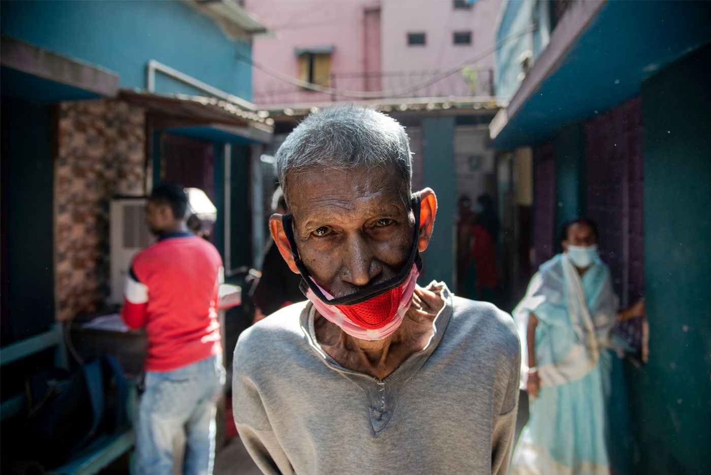 Right: 'I don't have the strength to stand. I used to work in the construction field. I came here to check my chest. Recently I have started coughing up pink phlegm,' says Panchu Gopal Mandal