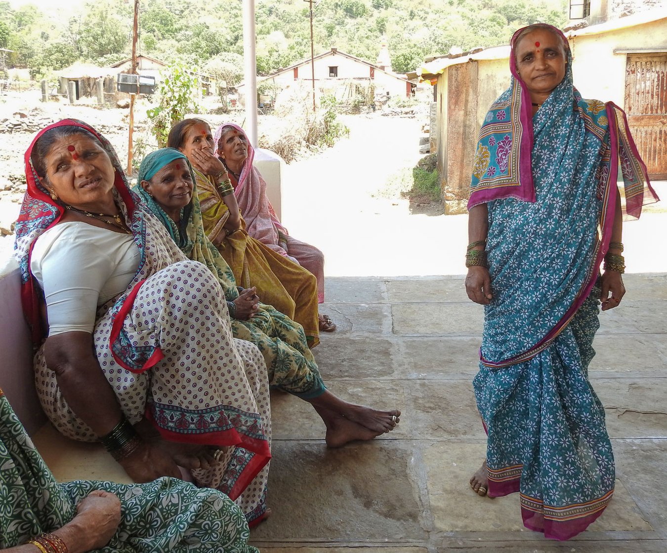 Left: Muktabai and Gulabbhau Ubhe are farmers in Khadakwadi. Right: Muktabai and others in the assembly hall of the Ram temple (file photo)
