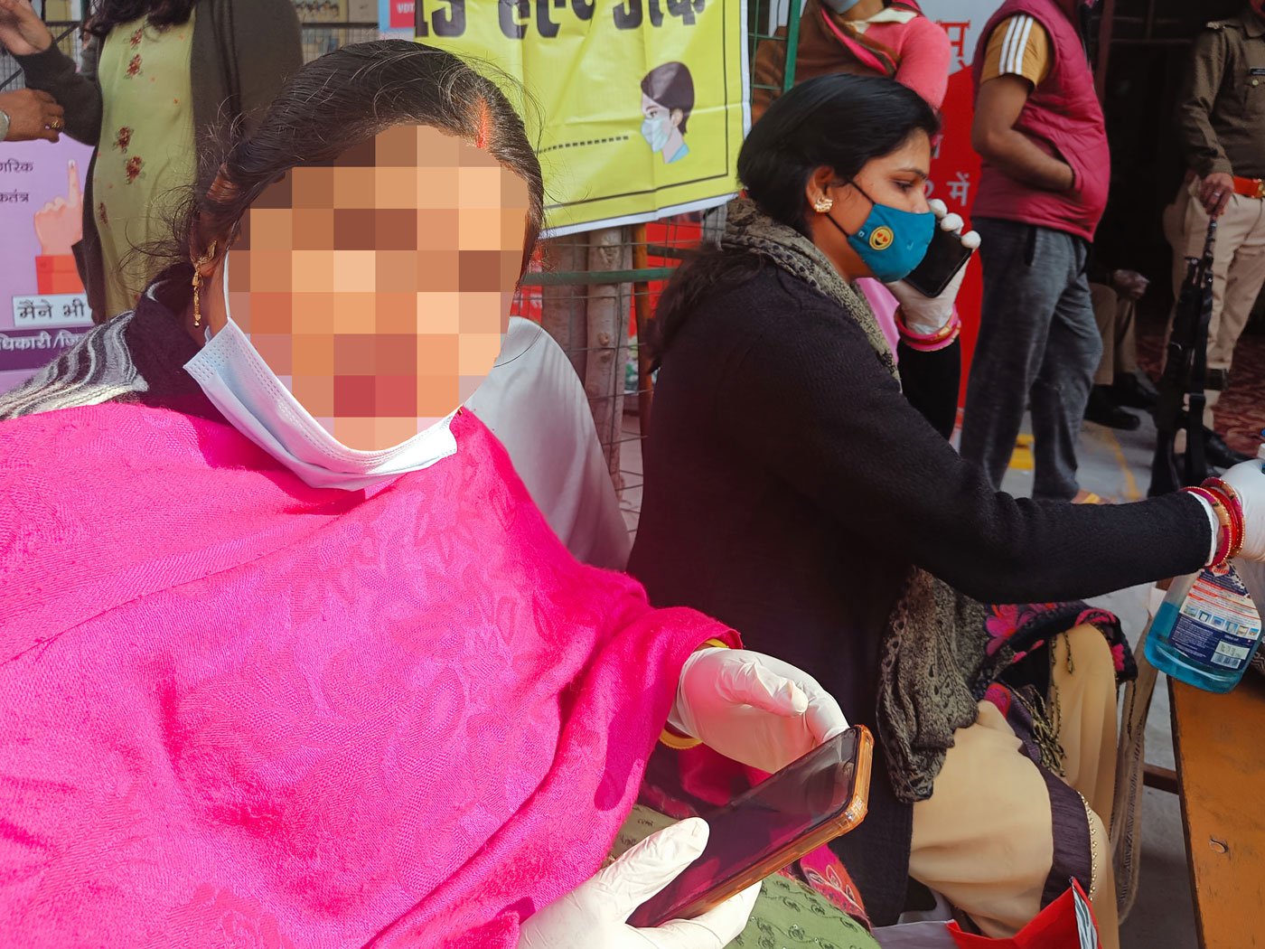 Health workers from primary health centres in UP were put on election duty across UP. They had to spray disinfectants, collect the voters' phones, check their temperature and distribute masks