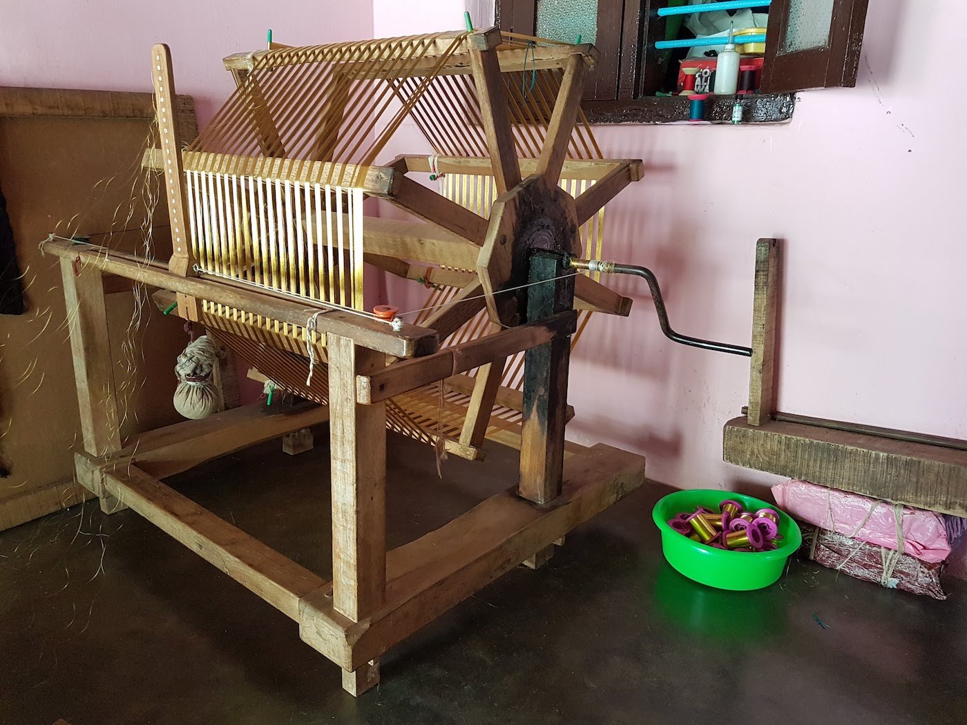 The charkha in Mani's home used to spin the kasavu (zari) into smaller rolls