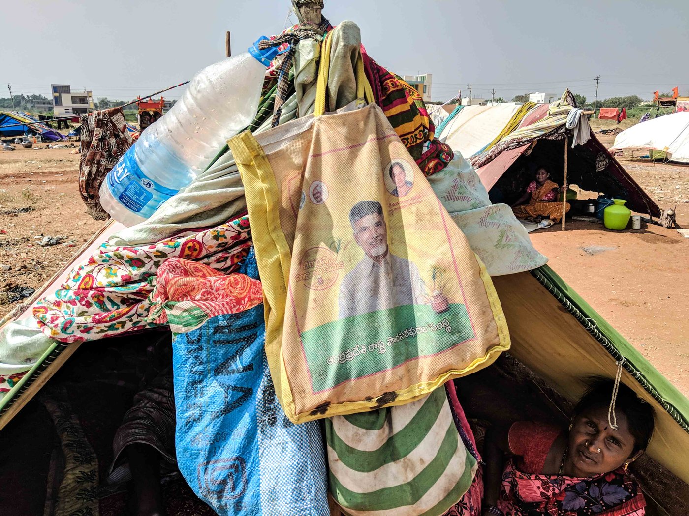 Bags with Chandrababu Naidu’s image, are given at ration stores in Andhra Pradesh.