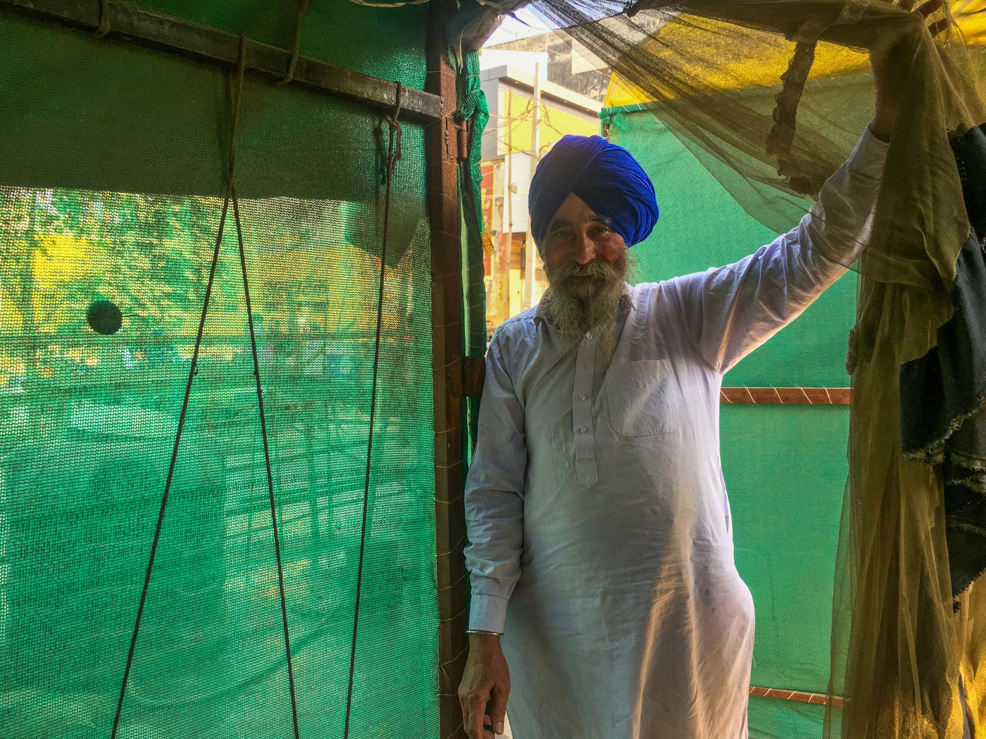 Tanna Singh with 85-year-old Joginder Singh, who has been staying in the same tent, as did many others who came from his village to the protest site