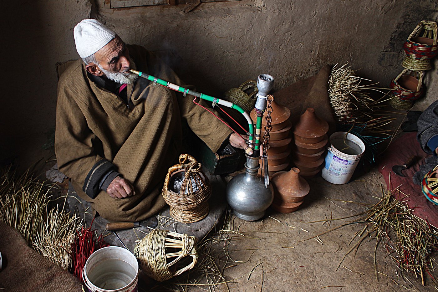 Khazir Mohammad Malik, 86, a resident of Charar-i-Sharief has been in the kangri trade for 70 years. “I inherited this art from my father,” he says. “People in Kashmir cannot survive the winters without a kangri. I feel happy when I see my kangris keeping people warm”
