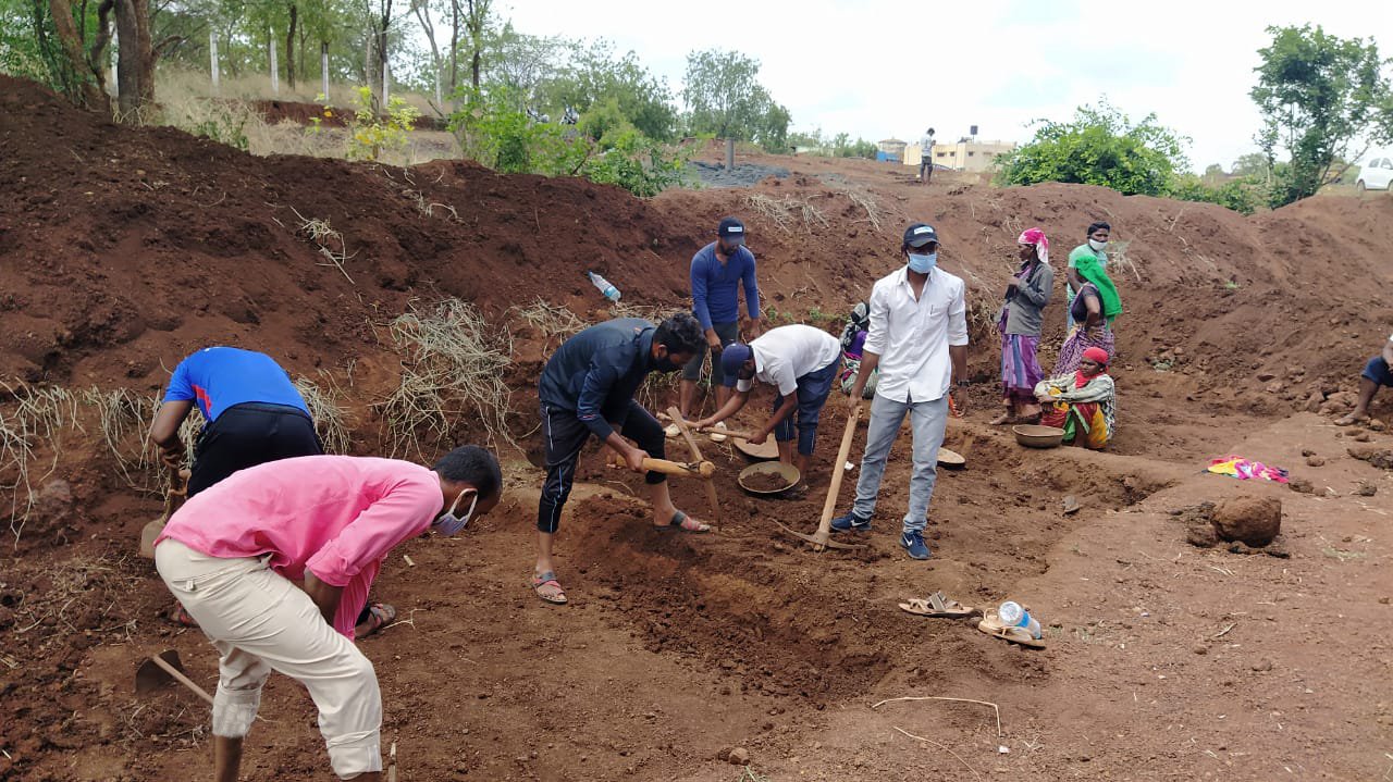 Atish Metre (right), who has completed his MBA coursework, also went to work at MGNREGA sites in Kamthana village in Karnataka